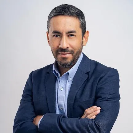 a large white machine with orange balls