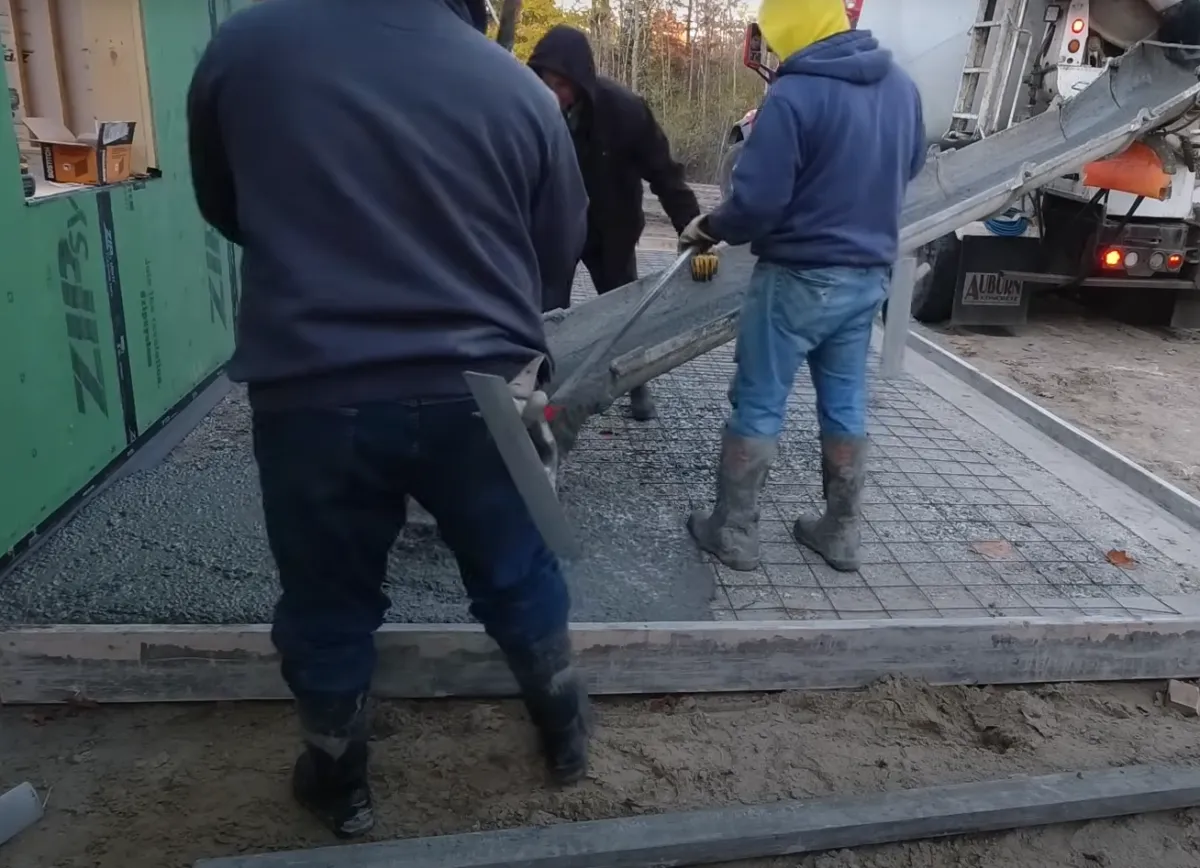 cement pouring  back patio