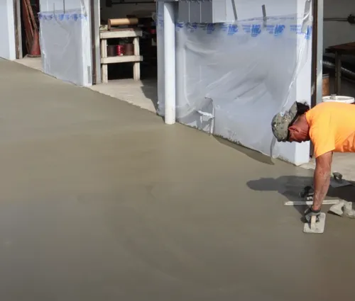 concrete contractors working on parking lot