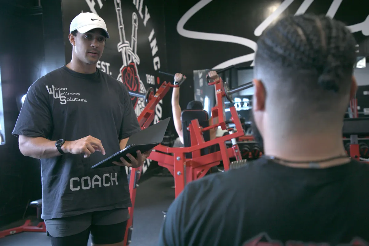 Dallas Personal trainer coaching a client