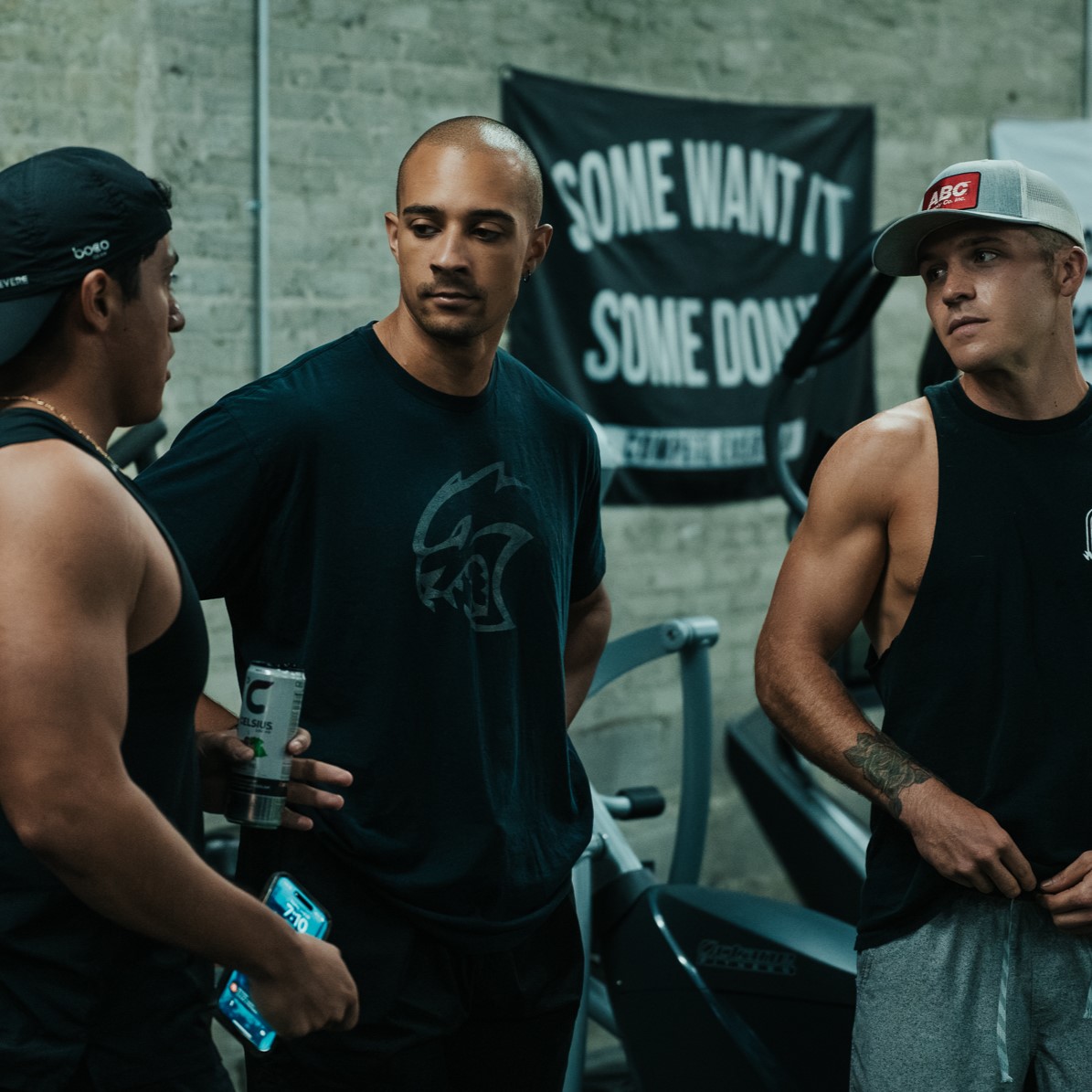 Small group trainer working with clients