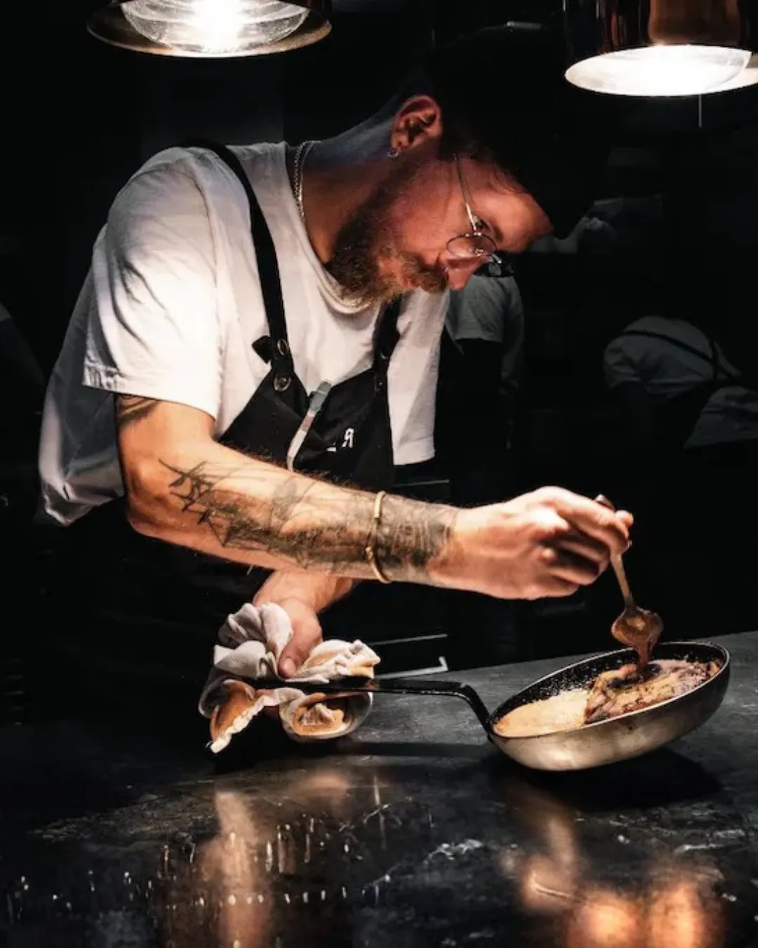six white and brown eggs on white towel