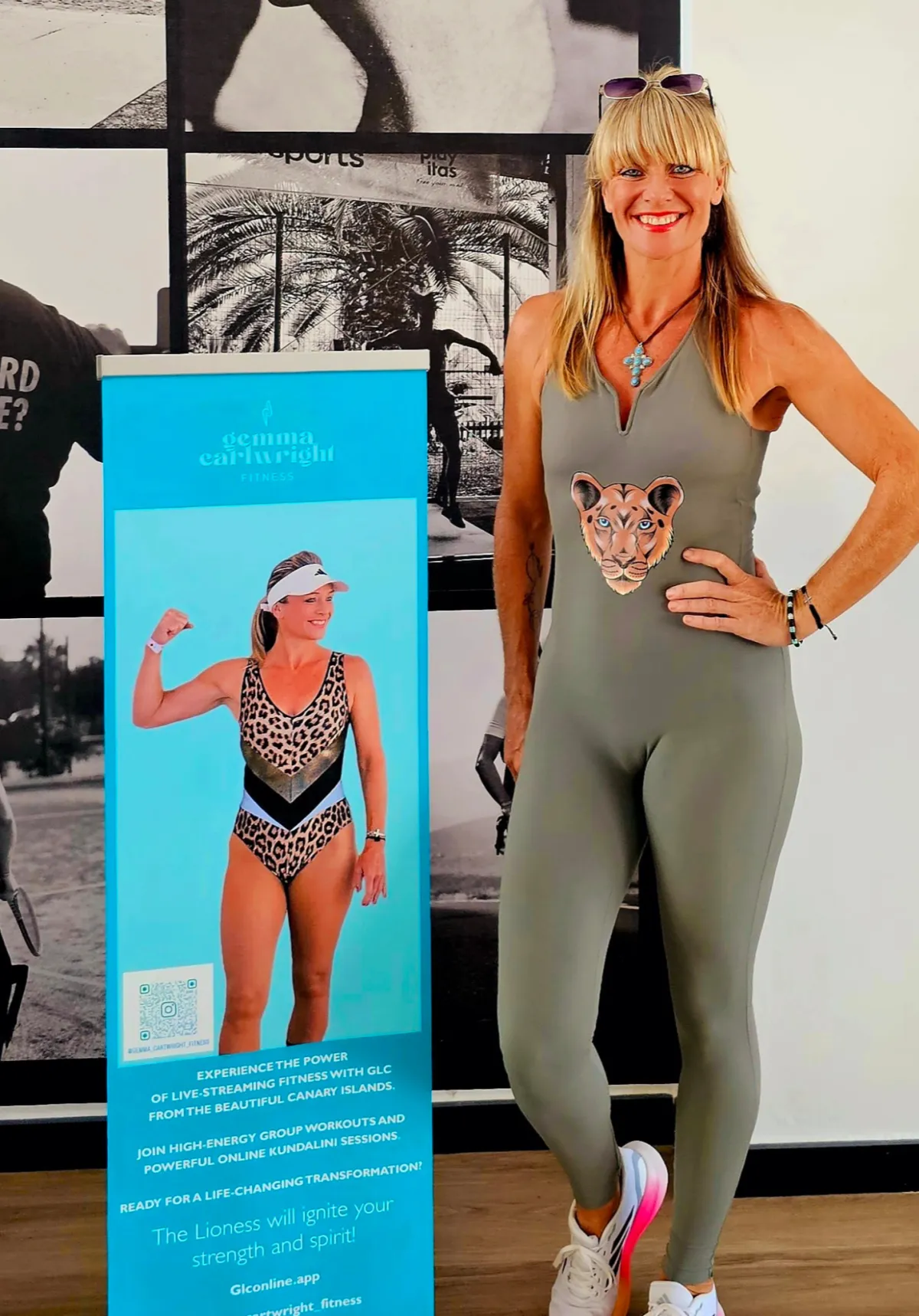 woman in black shirt and gray pants sitting on brown wooden bench