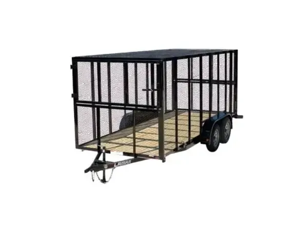Black double-axle trash trailer with high mesh walls and a ramp gate in Big Spring TX.