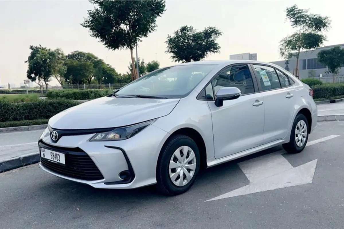 man in black jacket holding spark