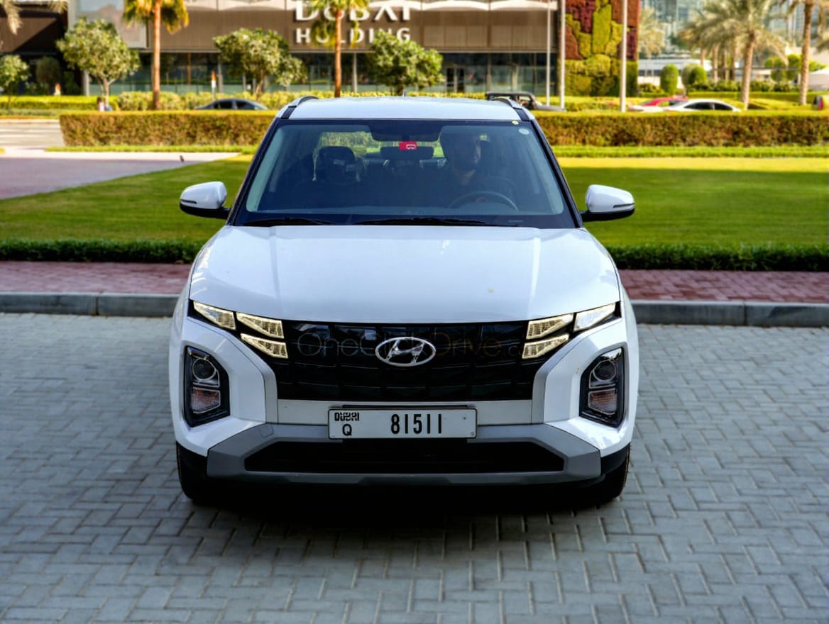 man in black jacket holding spark