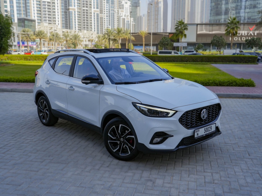 man in black jacket holding spark