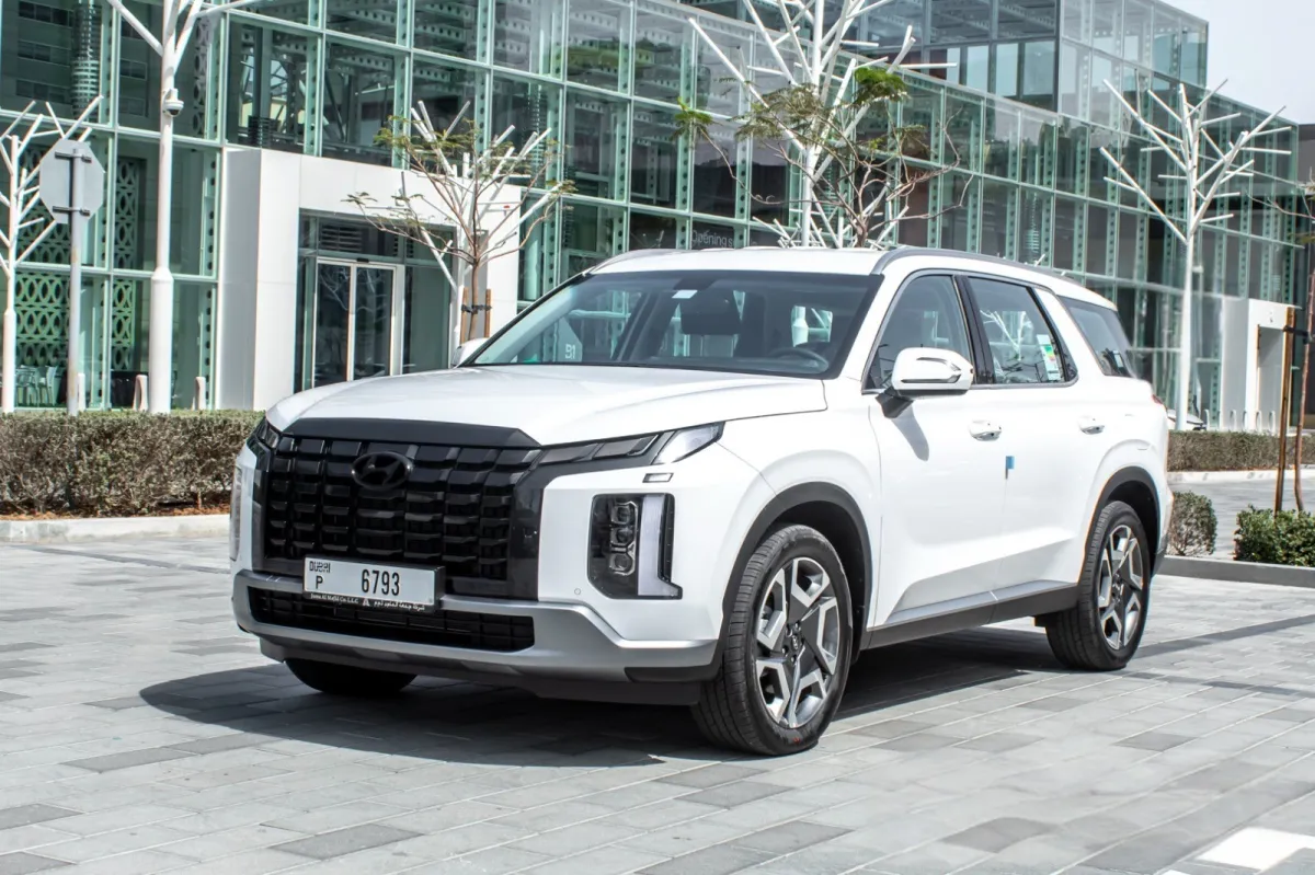 man in black jacket holding spark