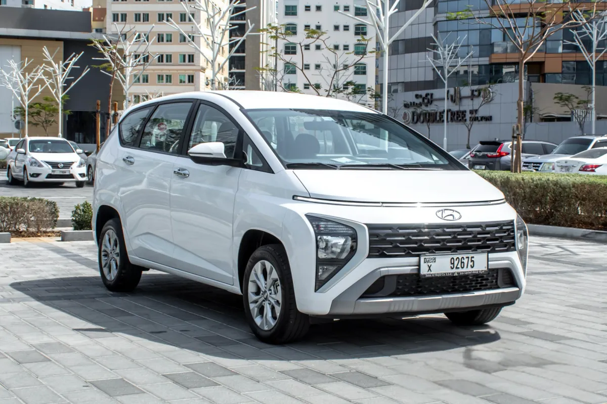 man in black jacket holding spark