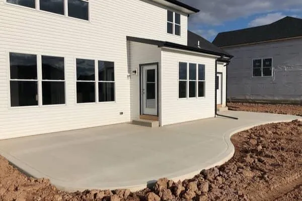 Organic shaped residential concrete patio installation