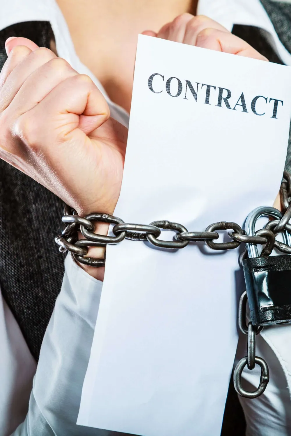 photo of woman hands in chains holding contract for solar law firm