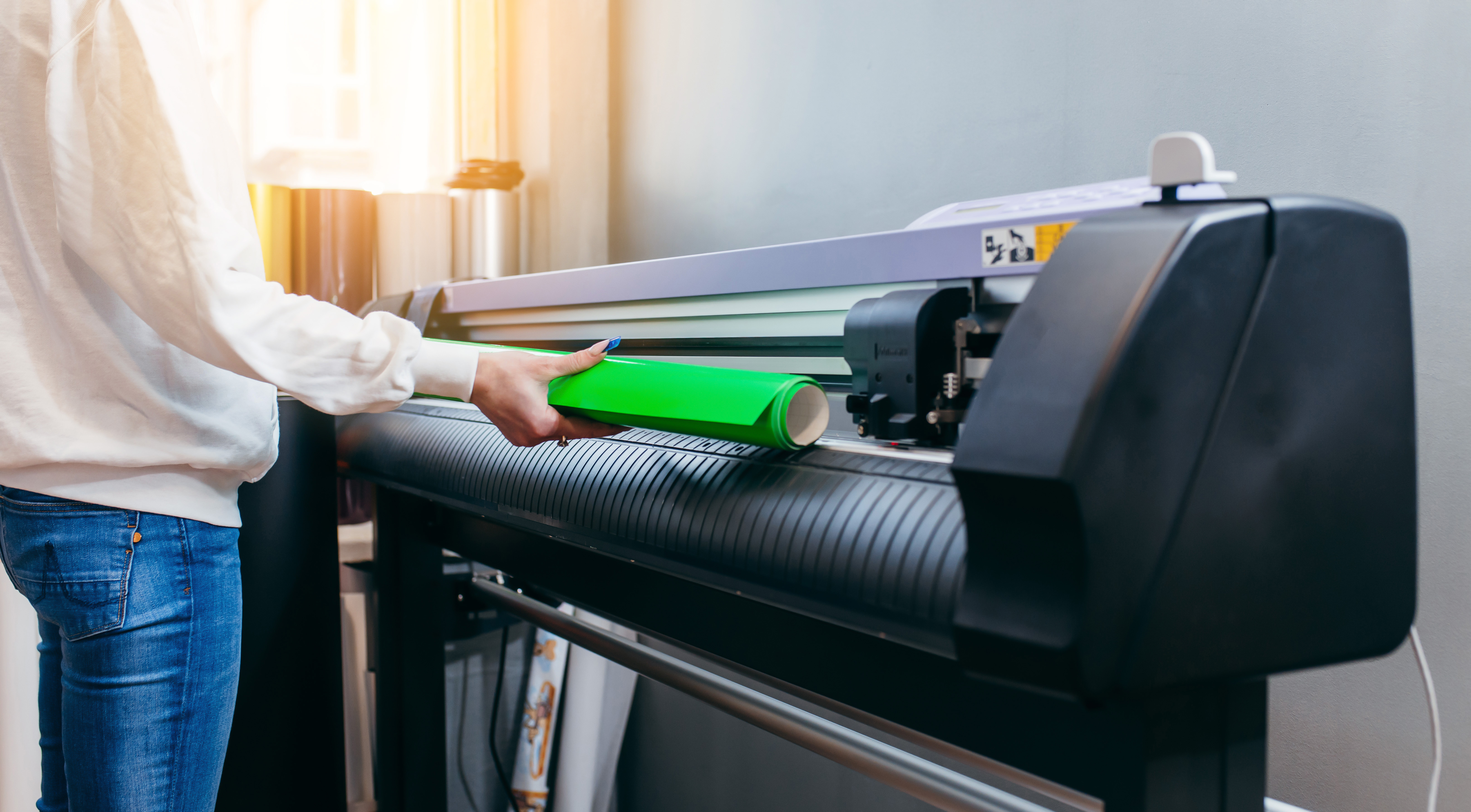 person writing on white paper