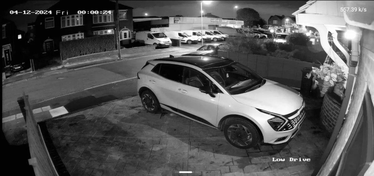 CCTV camera showing infrared night vision picture on a drive way