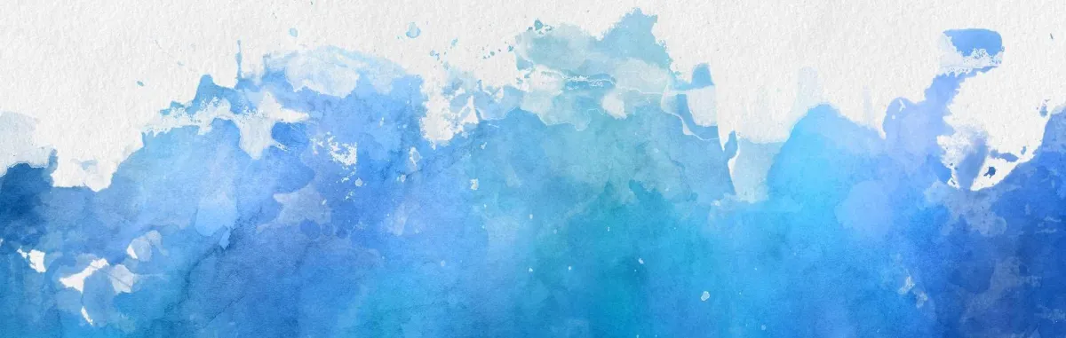 Abstract blue watercolors on a white canvas