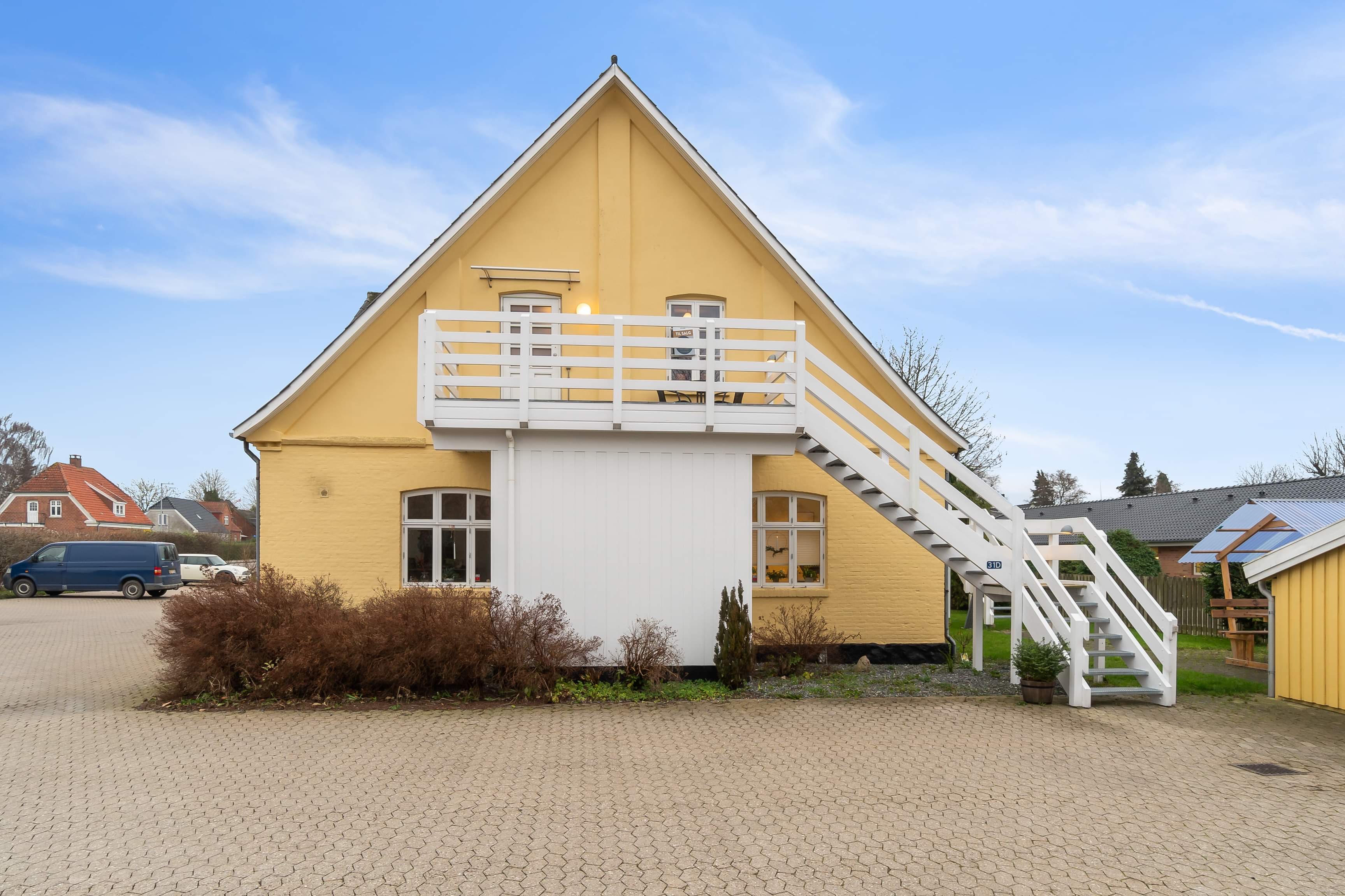 white and brown concrete building under blue sky during daytime