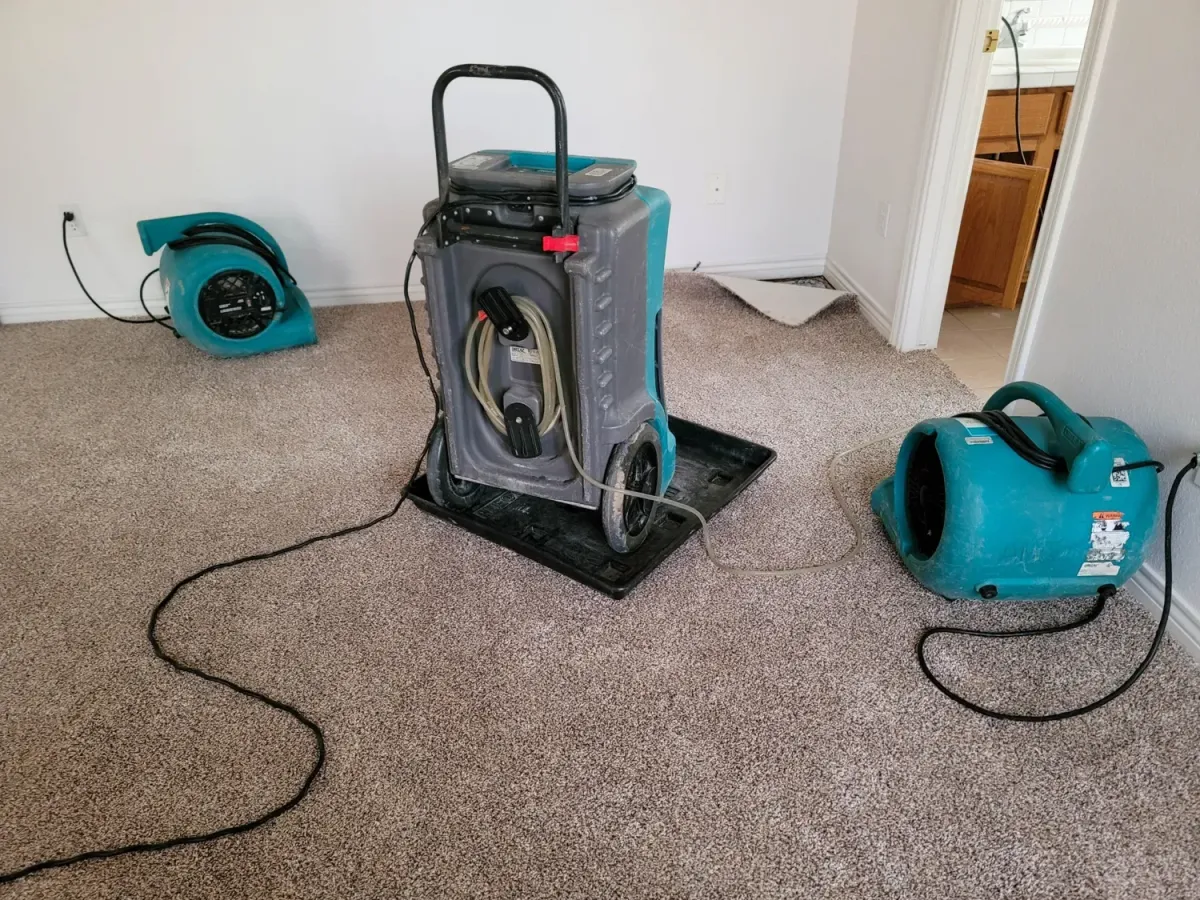 Water Damaged Home Being Dried With Dehumidifiers and Air Movers