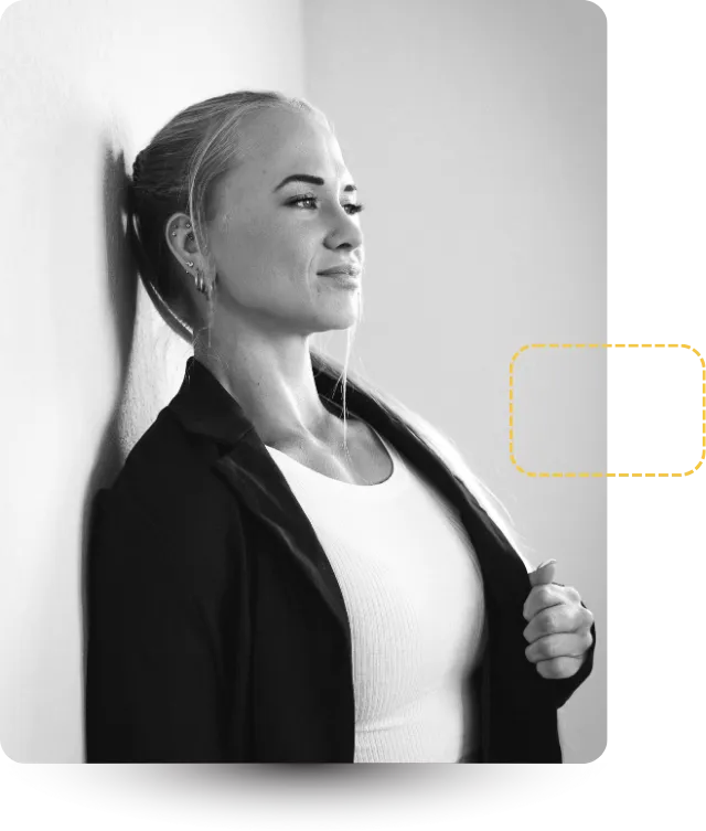 Dynamic fitness portrait of a determined individual lifting in a bright gym, strong contrast to emphasize muscle and effort, shallow depth-of-field, high-resolution with natural highlights to signal strength and resilience.