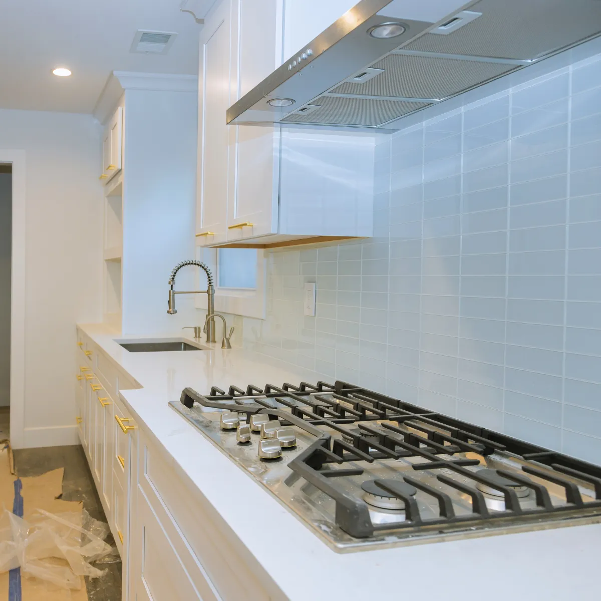 Luxury kitchen remodeling with custom cabinetry and backsplash in Portland