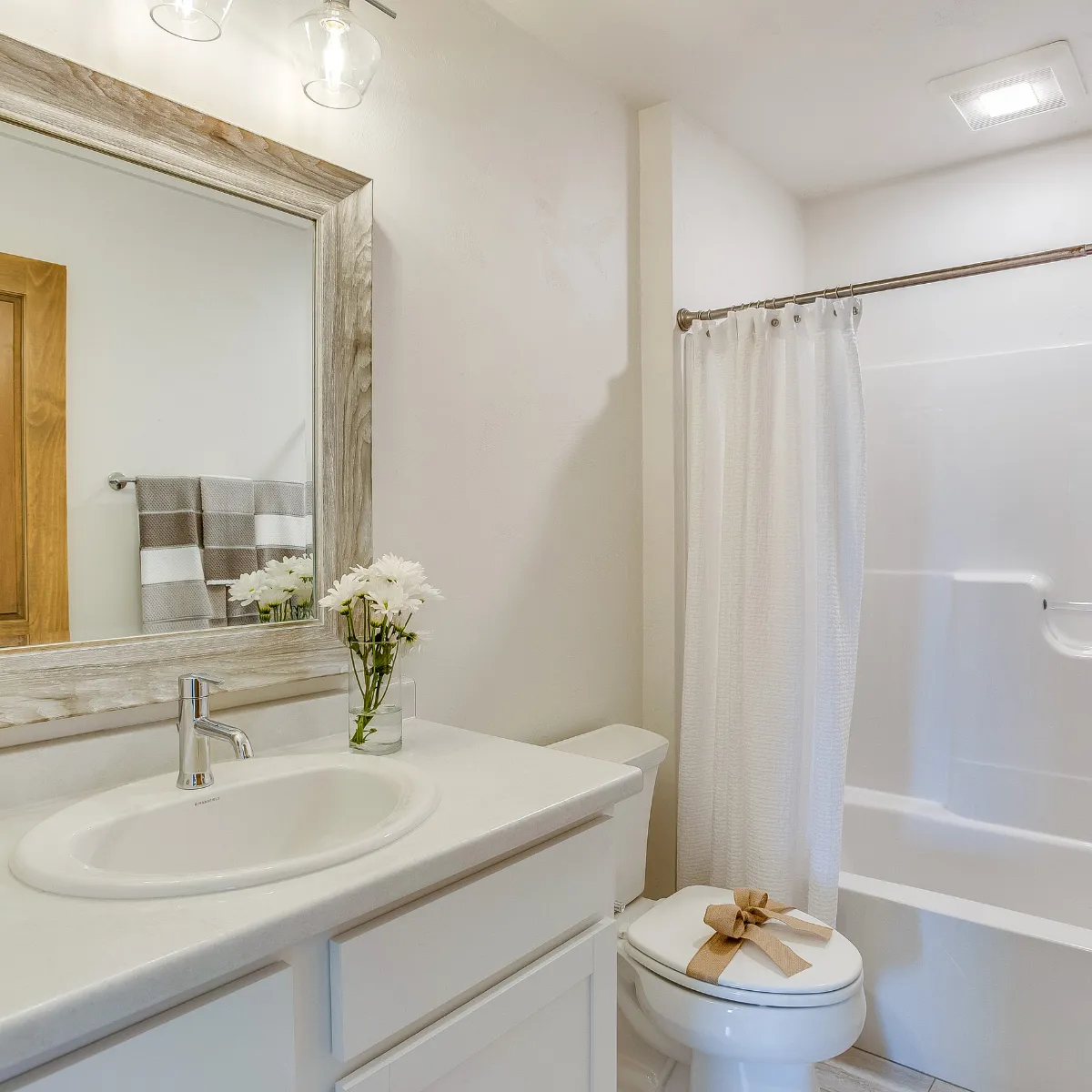 Beautiful bathroom renovation featuring custom vanity and shower installation in Portland