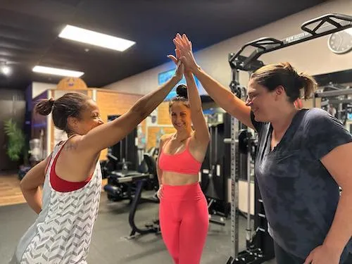 woman lifting barbell