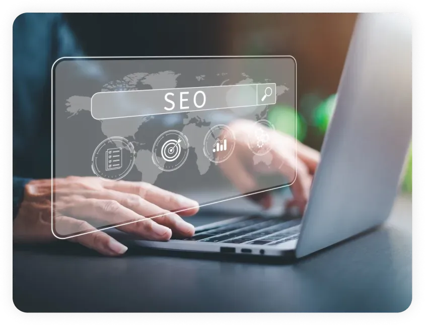 Hands typing on a laptop with a virtual SEO interface overlay, highlighting data-driven strategies for effective Dallas SEO services and improving search engine rankings.