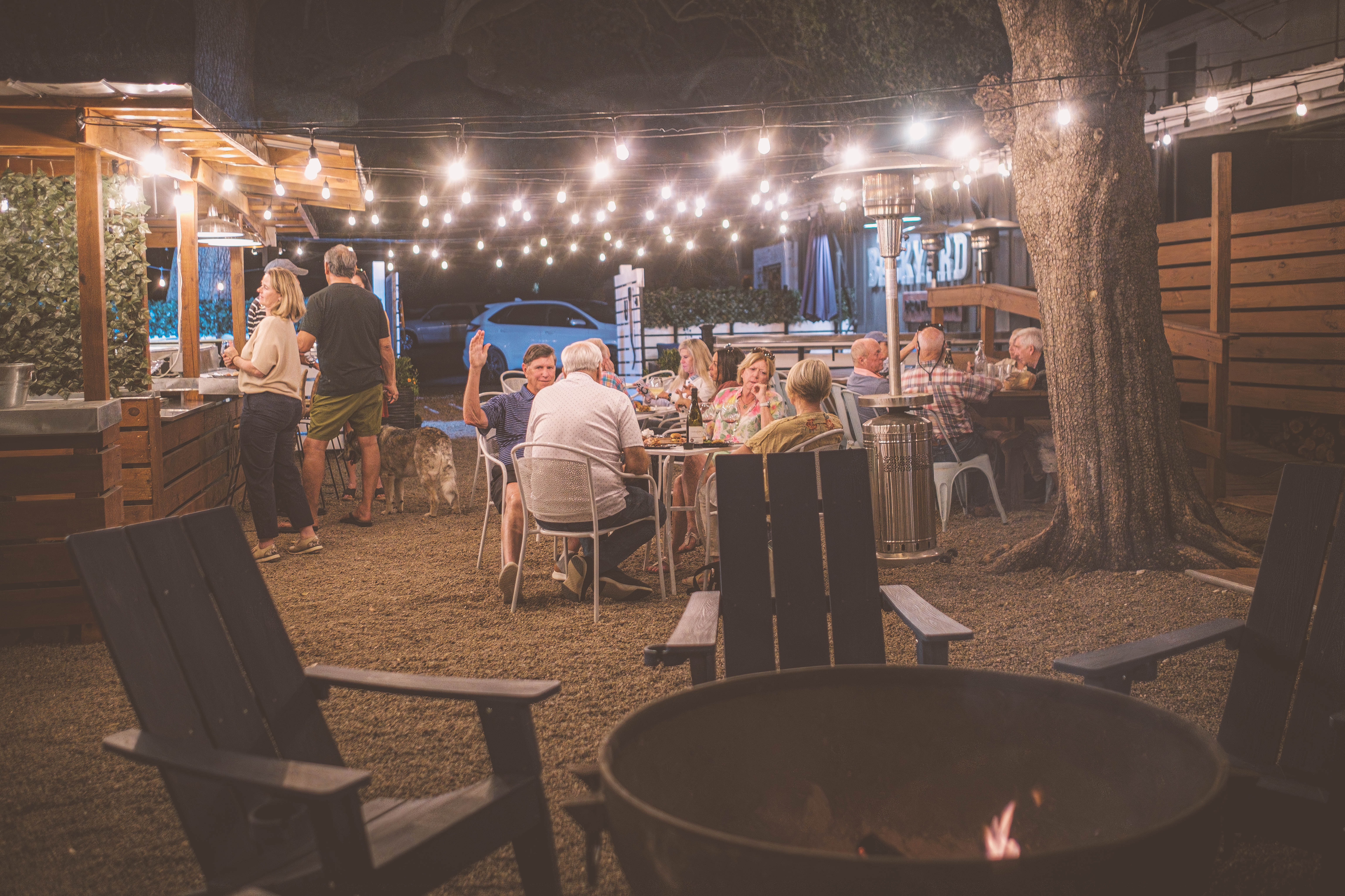 The Backyard Aiken outdoor dining at night