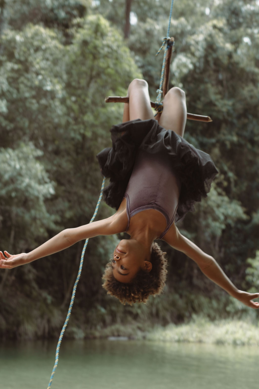 a man standing on a beach looking at the ocean