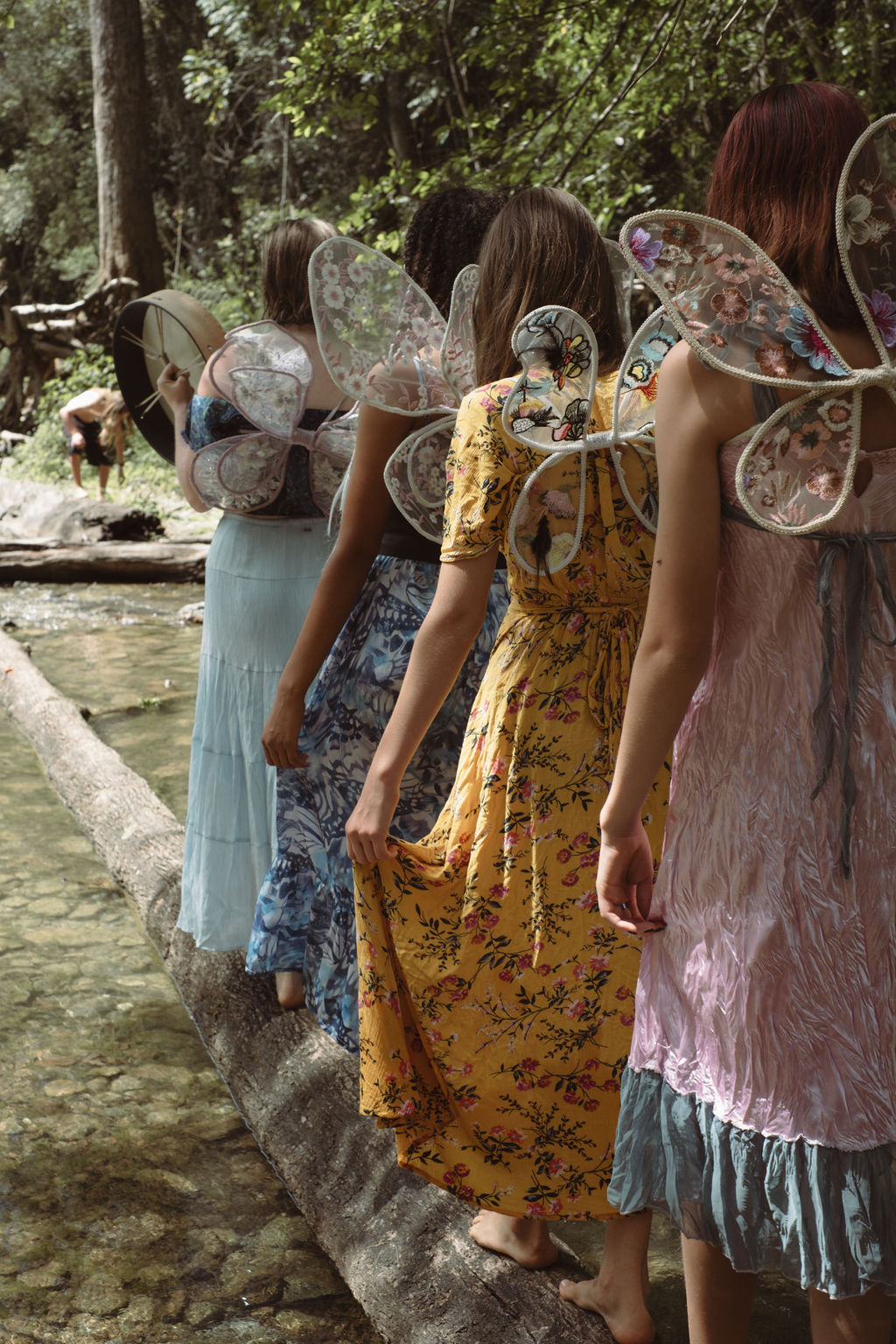 a man standing on a beach looking at the ocean