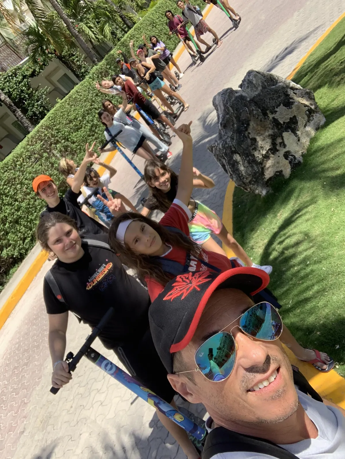 Lime scooter parked in a bike rack.