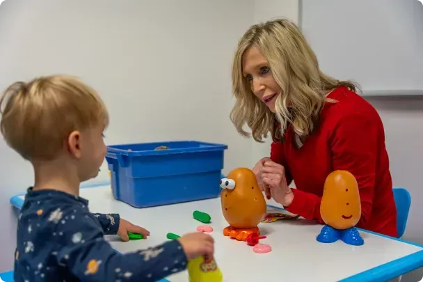 occupational therapy doctor with child