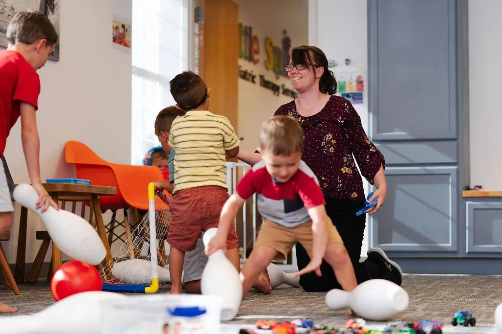 occupational therapy doctor with child