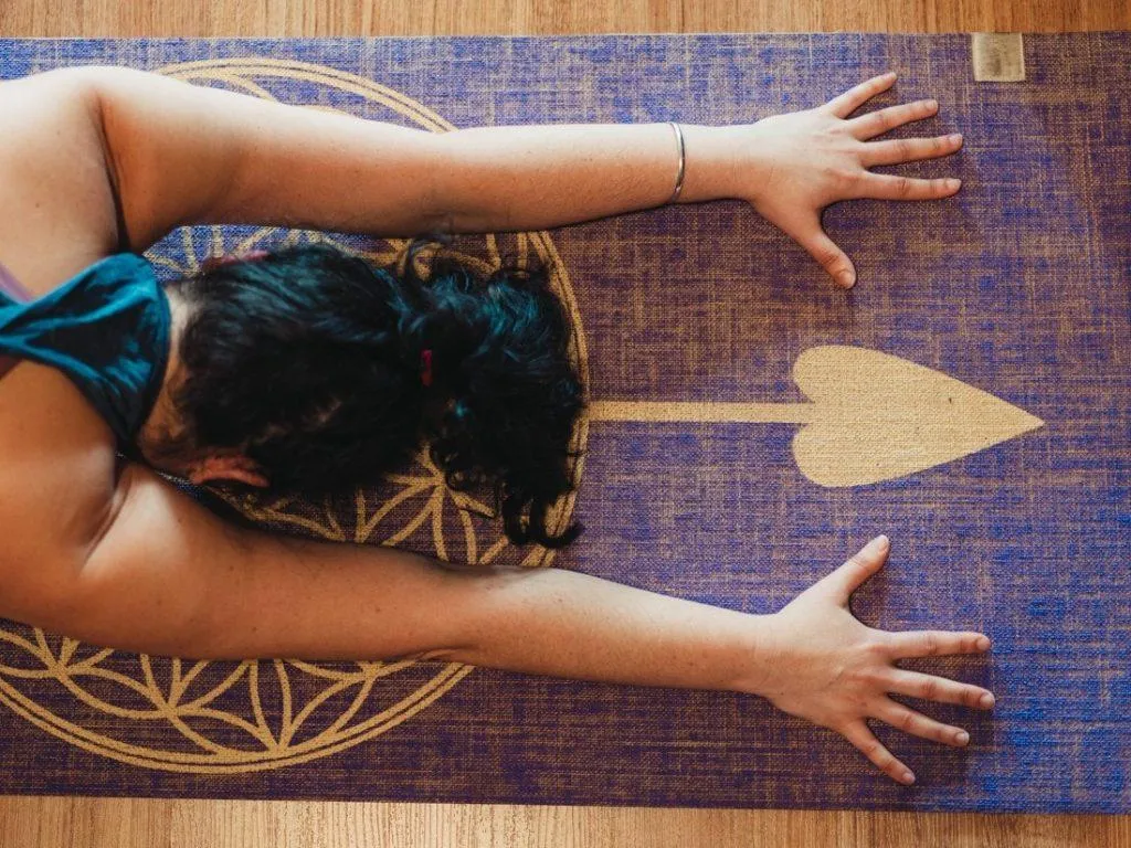 Yoga mat set up in a calm room ready for a short daily practice