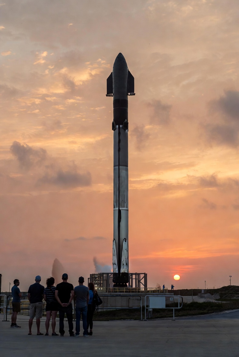 Wide, calm landscape of a North Florida pine flatwoods trail at golden hour with a small group of people in casual outdoor clothing, photorealistic, inviting mood for experiential learning.