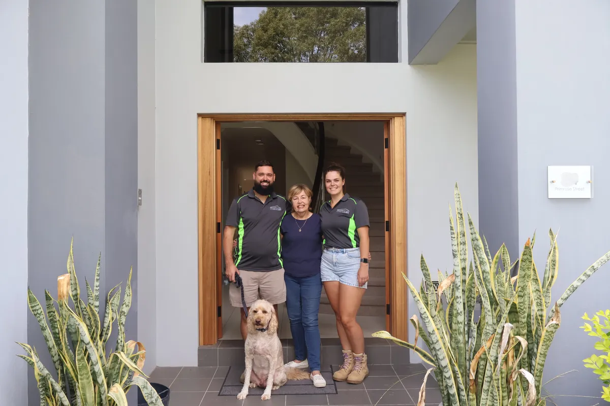 Client with Sharpe & Co team at their completed Hills District home renovation