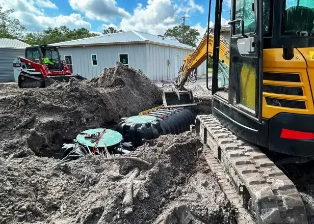 Septic Specialists Installing a New Septic Tank