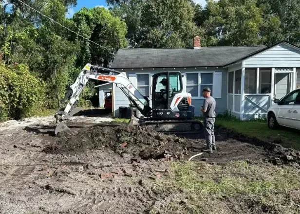 Septic Specialists Repairing a Drain Field