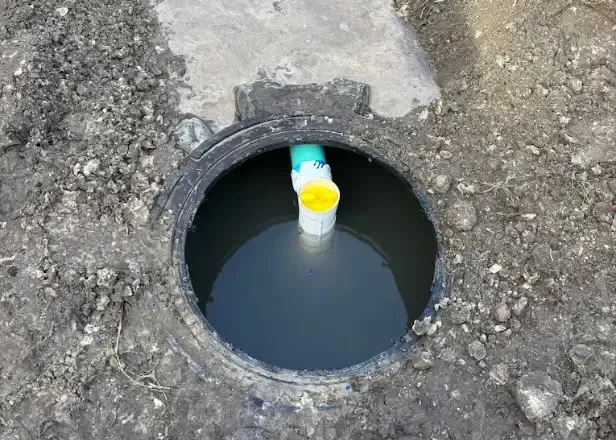 Septic Specialists Inspecting a Septic System