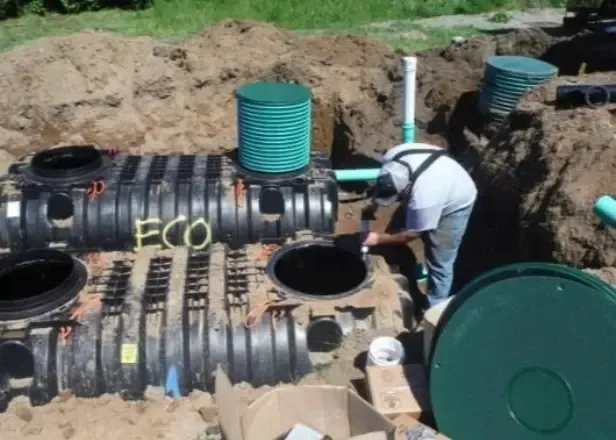 Septic Specialists Repairing a Septic System