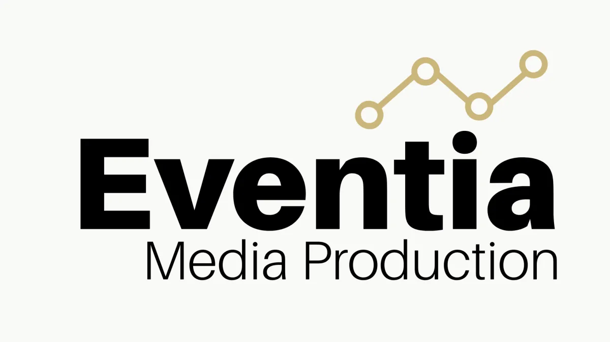A diverse team of media professionals collaborating in a modern studio, surrounded by cameras, lighting equipment, and digital screens, all focused on a creative project. The setting is vibrant and energetic, reflecting innovation and teamwork.