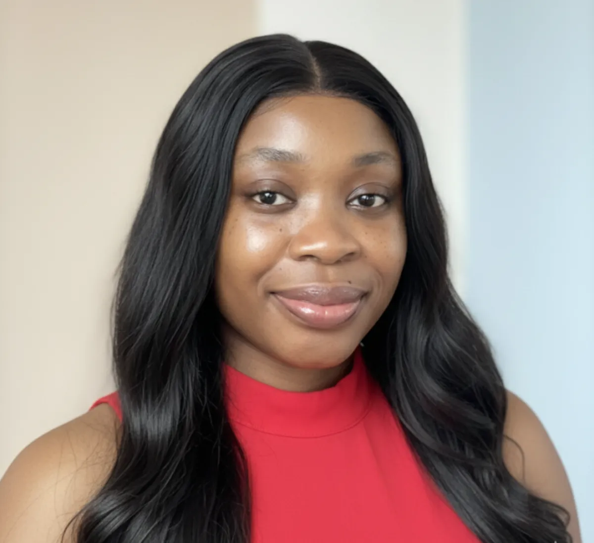 A beautiful lady wearing red with a long black hair