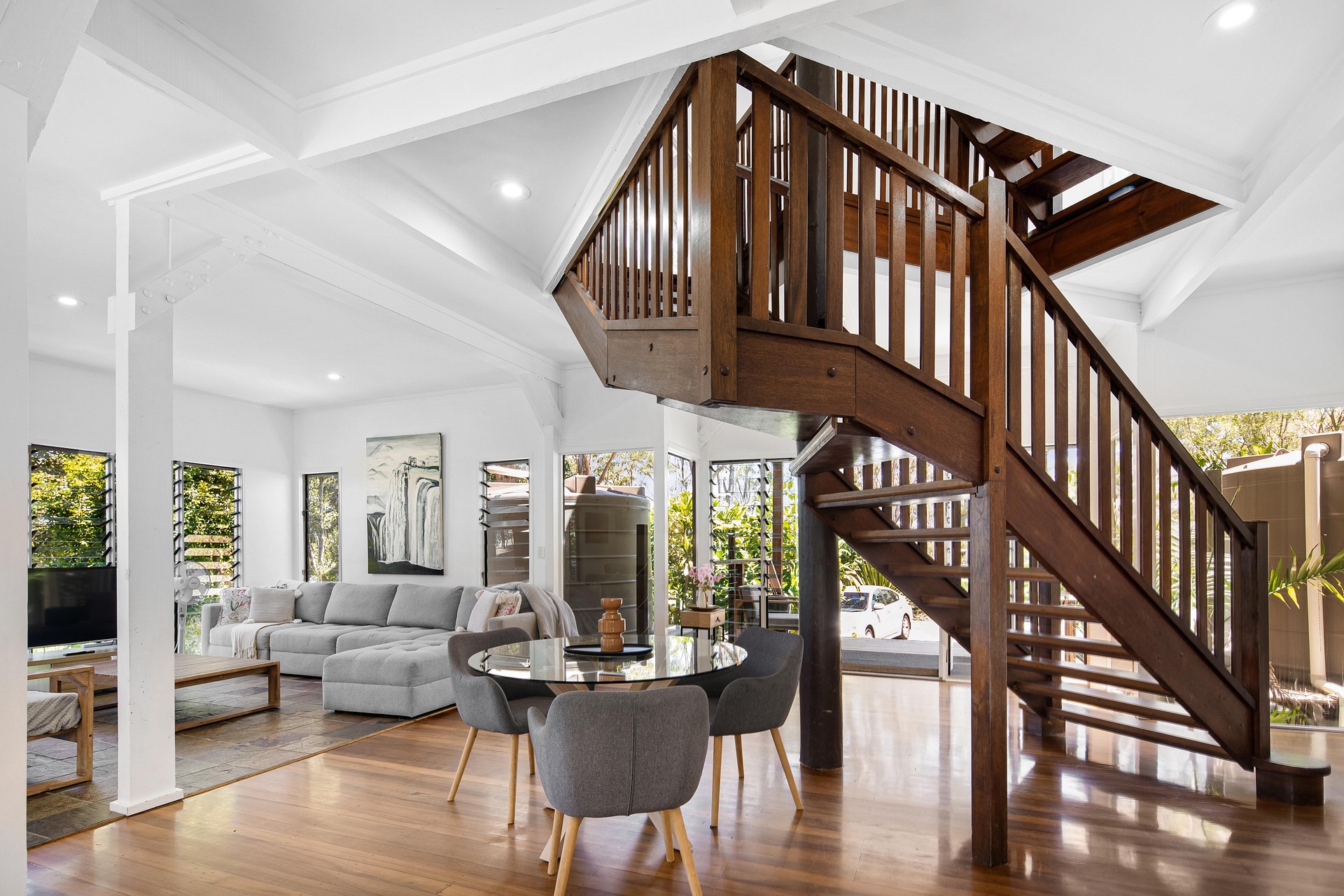 Custom hardwood flooring installed in a renovated residential room