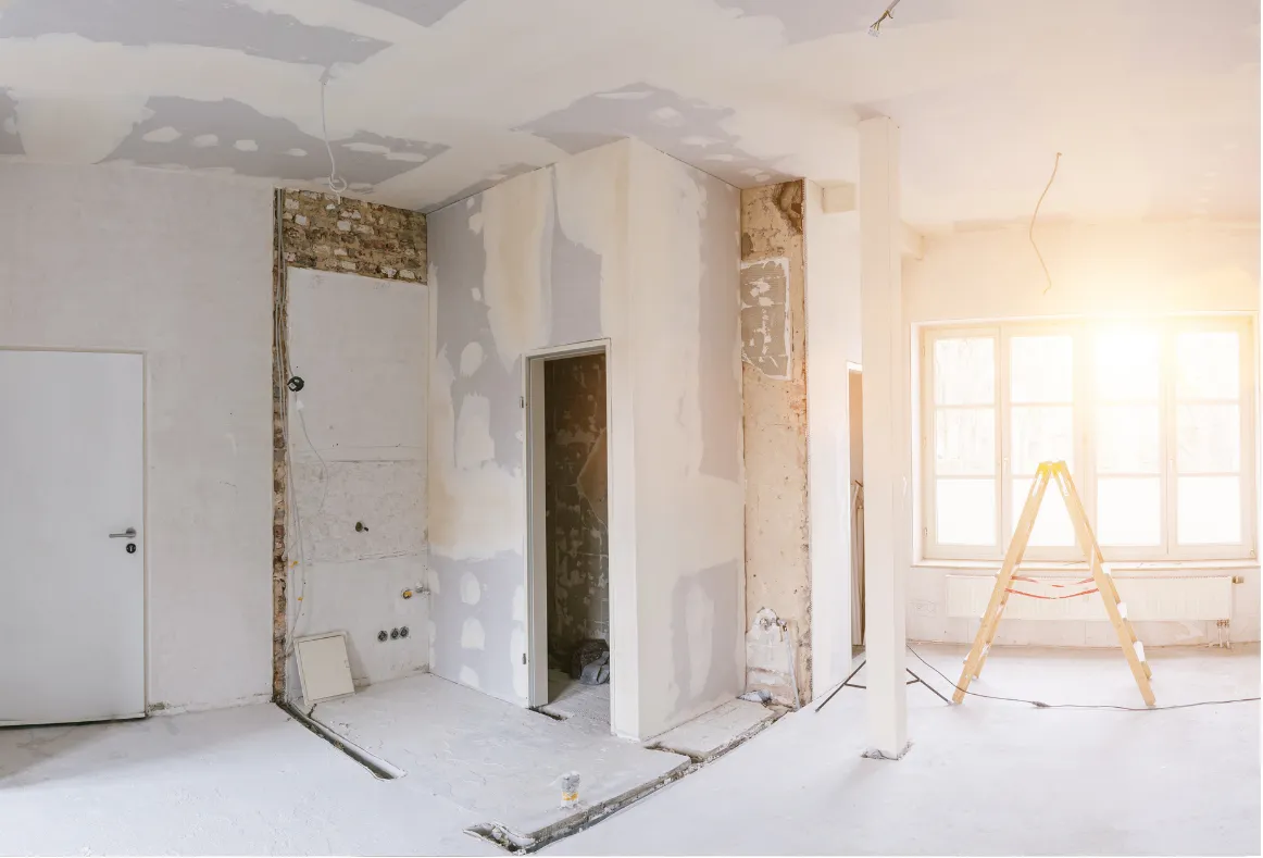 Interior remodeling project with walls and finishes under renovation