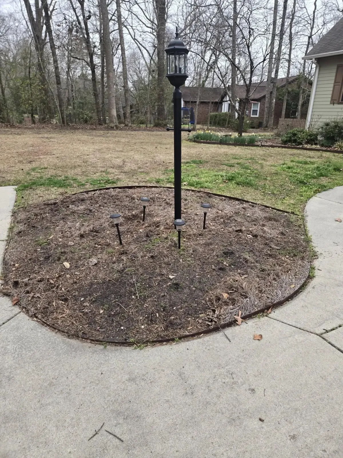 Lamp post garden bed