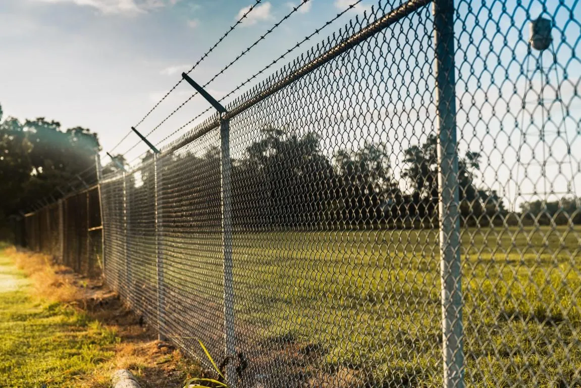 commercial chain link fence with barbed wire Weston, FL