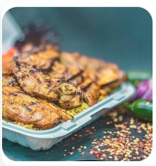 Spiced Lamb Bowl with rice and garnish