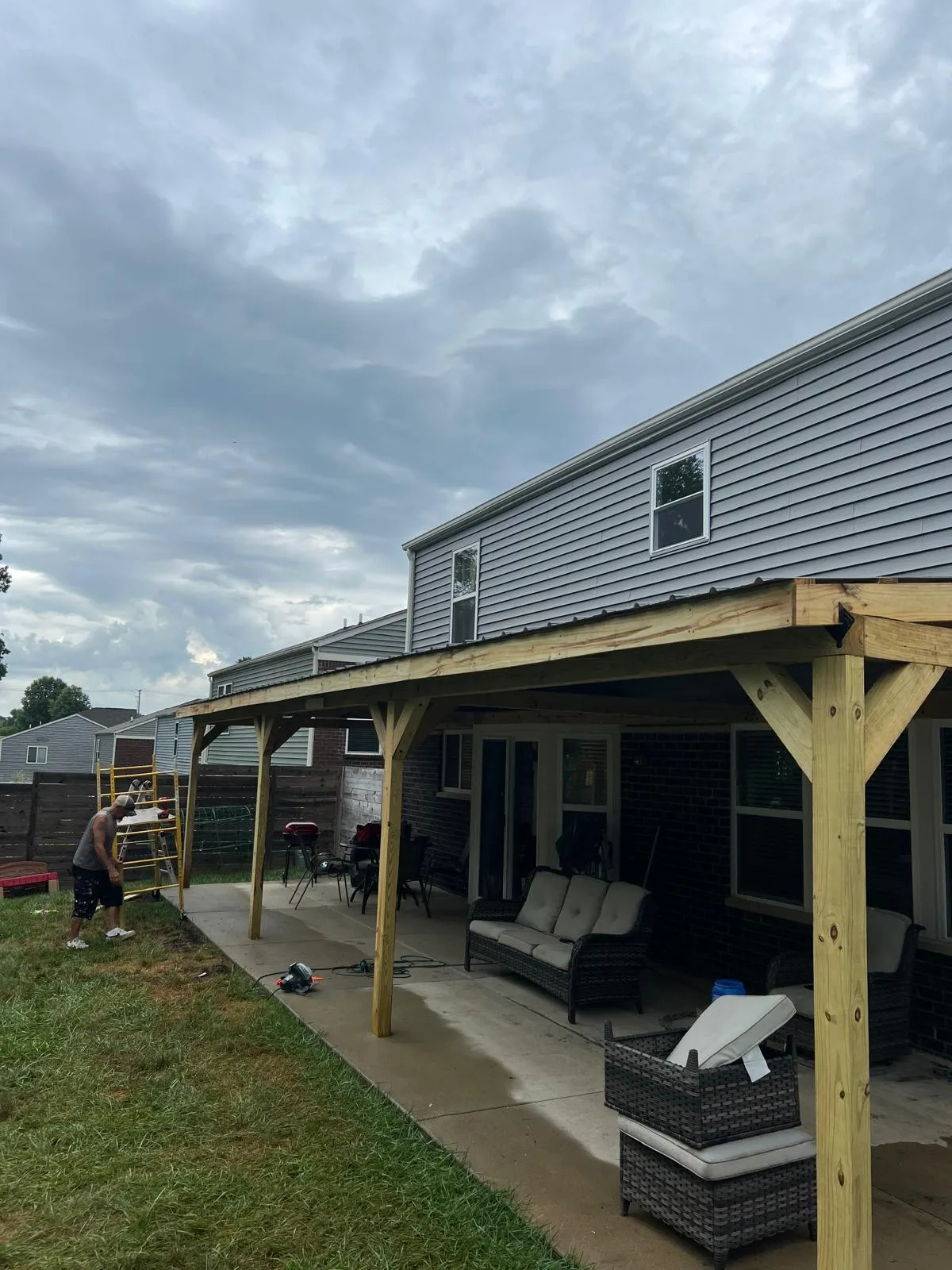 Custom patio cover installation by Bottom To Topps Handyman Services in Louisville, KY.