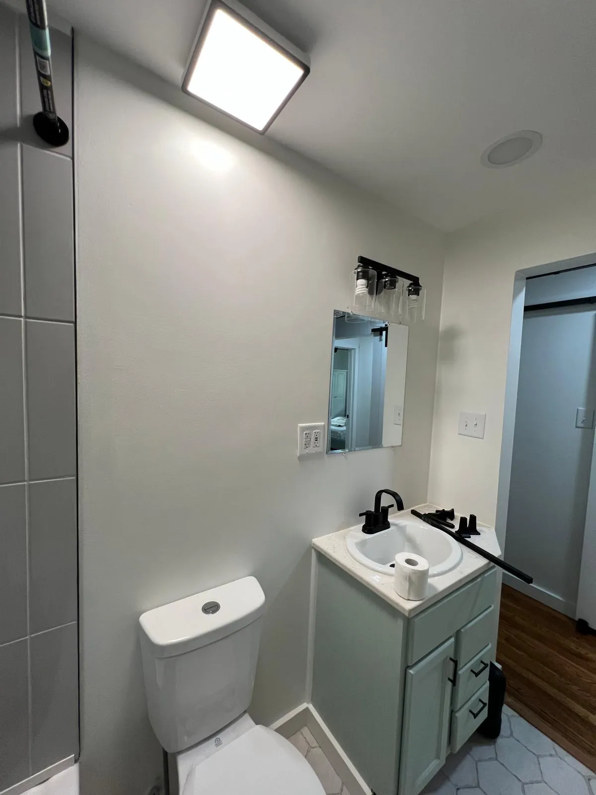 Bathroom vanity and fixture installation by Bottom To Topps Handyman Services in Louisville, KY.