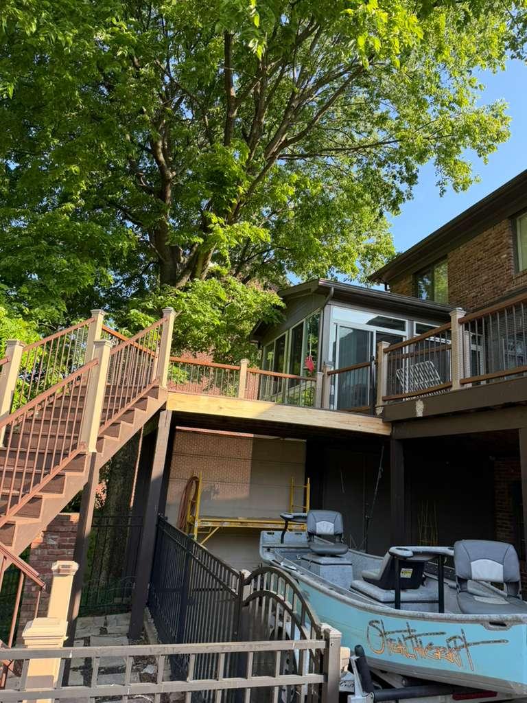 Elevated deck and staircase project completed by Bottom To Topps Handyman Services in Louisville, KY.