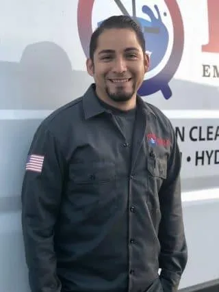 man holding phone white using MacBook
