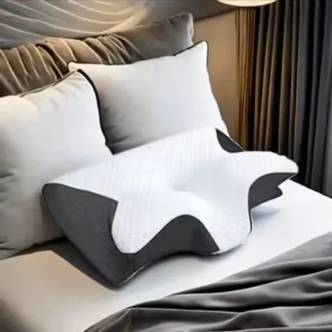 Almohada ergonómica SueñoCálido sobre una cama